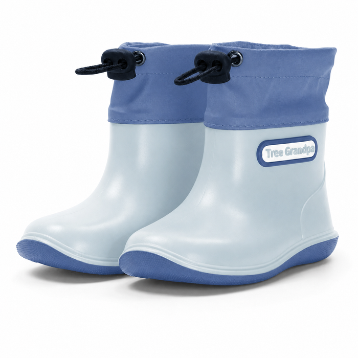 A pair of Tree Grouse children's rain boots in light blue and medium blue, featuring black drawstring ankle cuffs and a blue outsole, shown on a white background.